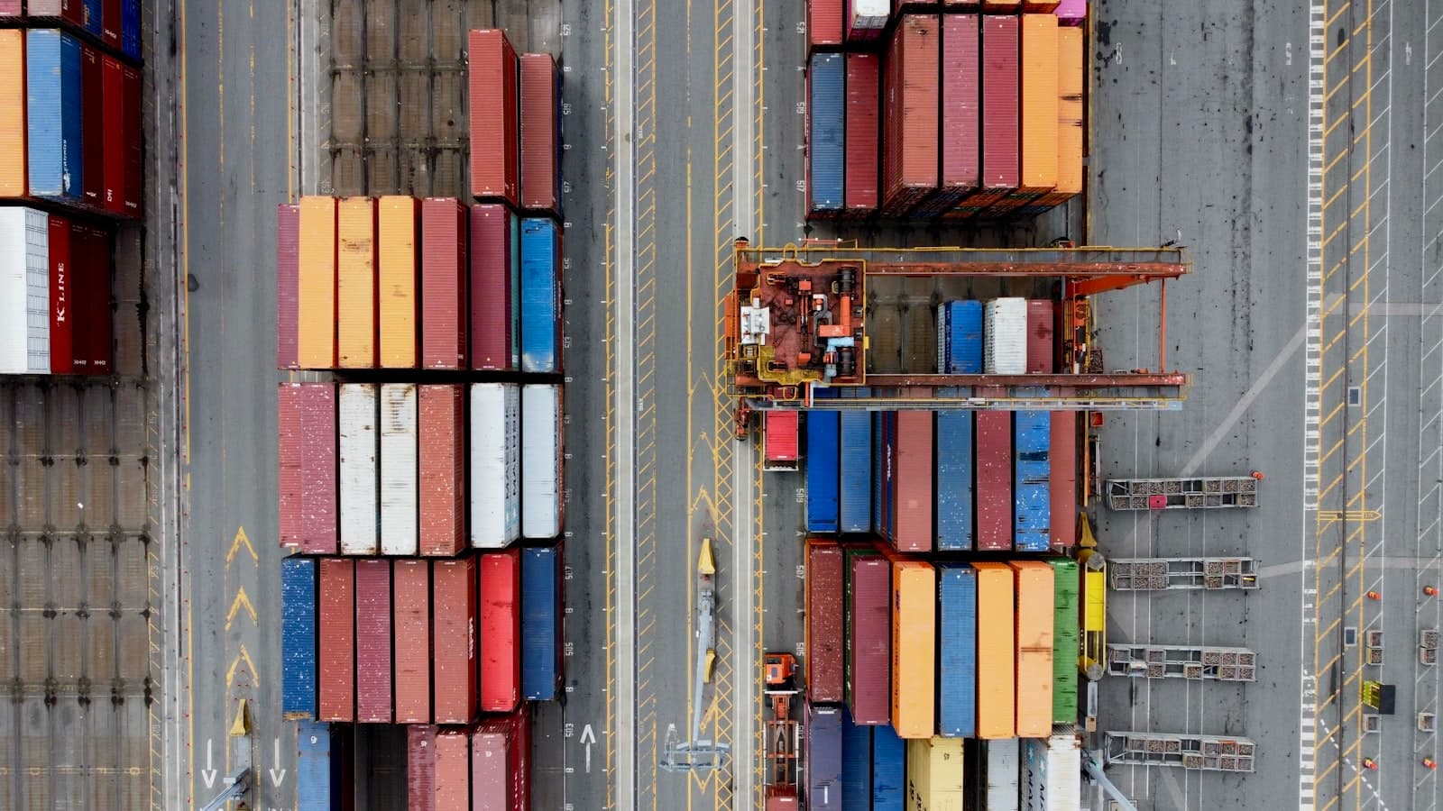 Aerial view of a freight yard and container stacks