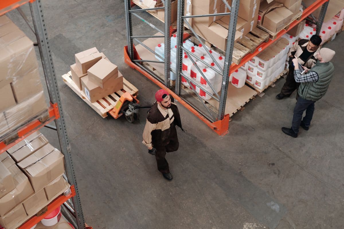 Warehouse team coordinating a consignment